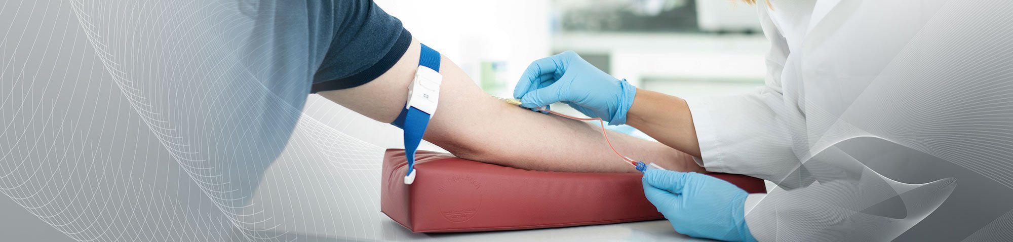 Doctor collecting blood from patient